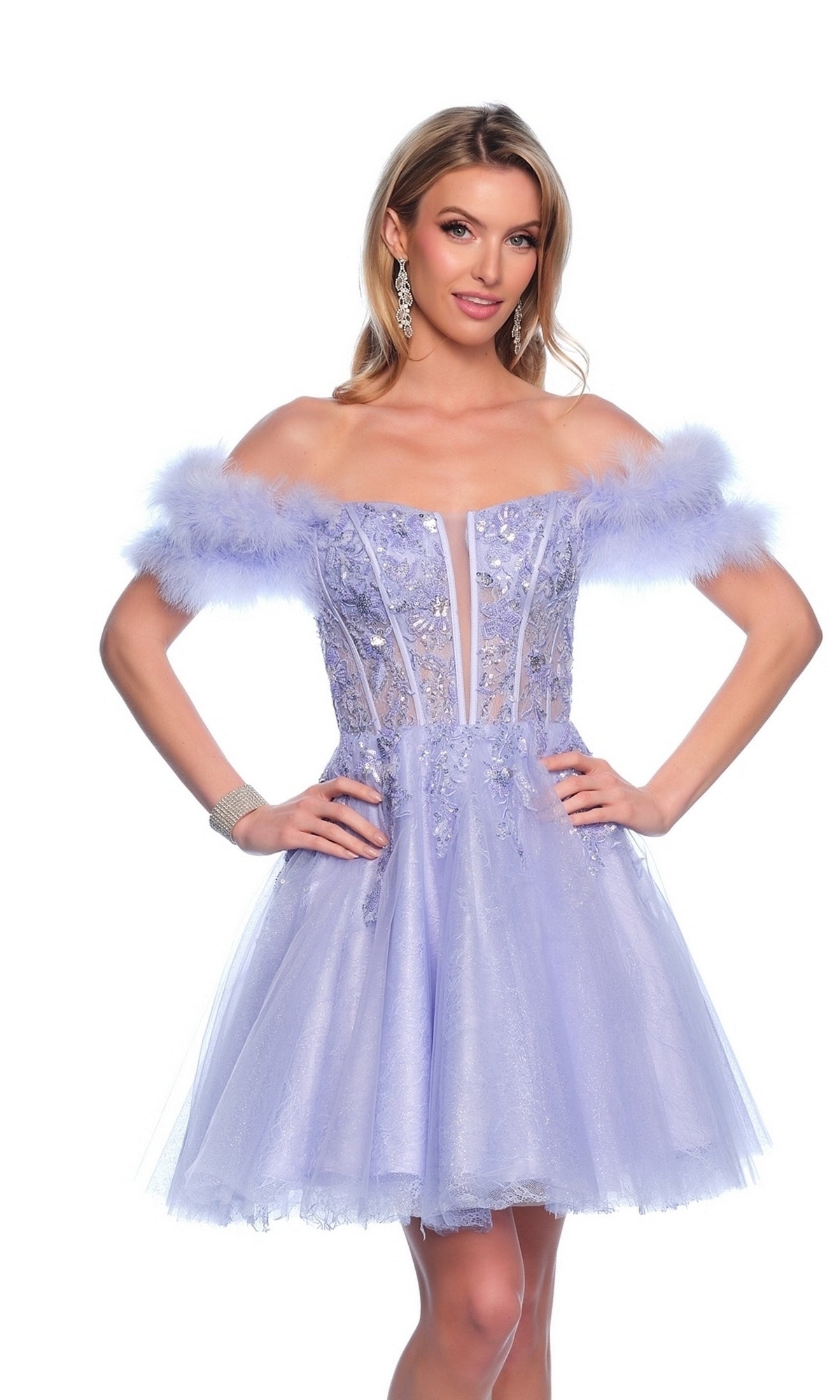 A woman stands hands on hips in the Dave & Johnny Feather Short Hoco Dress 11775, featuring an off-the-shoulder design, feathered sleeves, lace embroidery, a beaded sheer corset, and a flared tulle skirt.